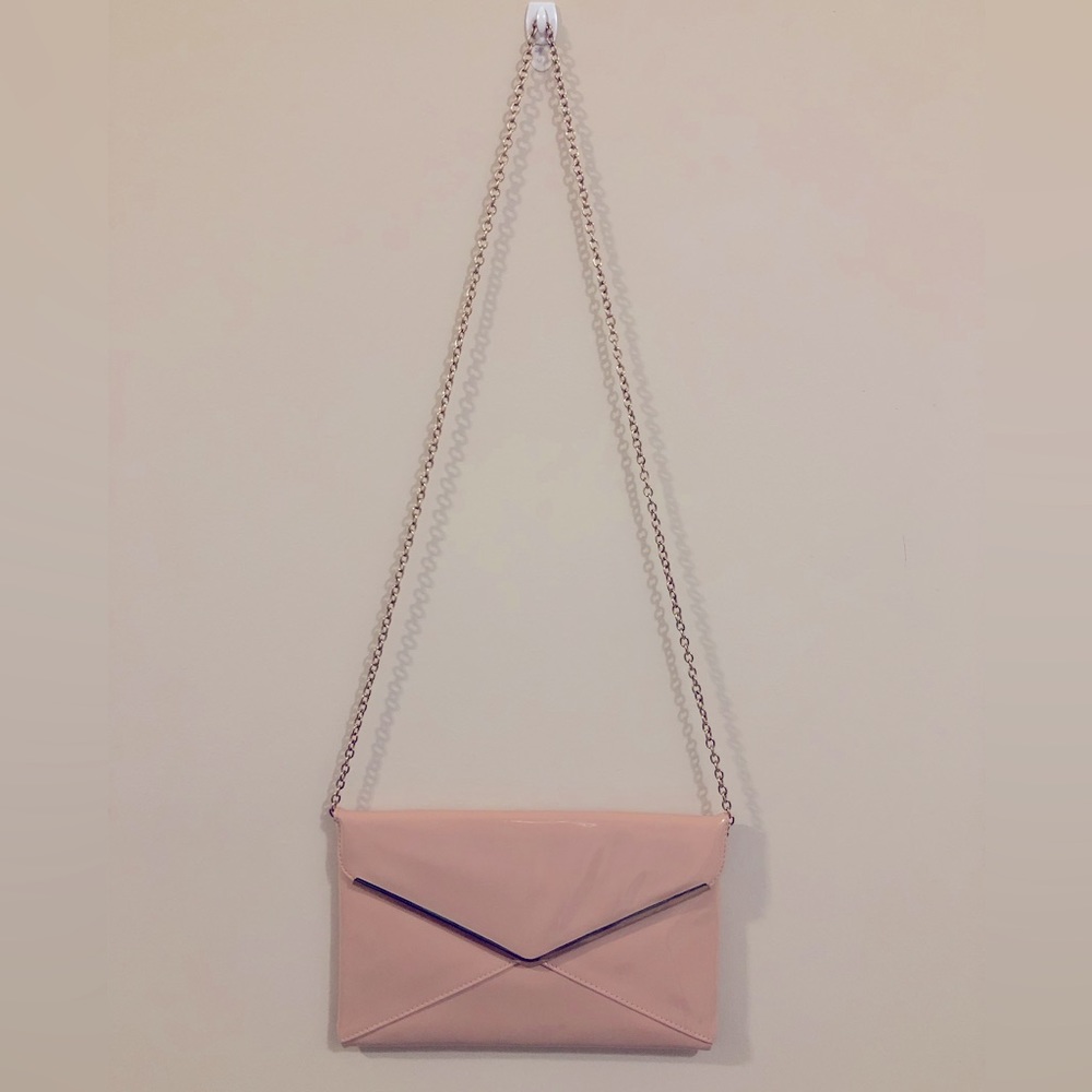 Light pink envelope clutch with gold hardware